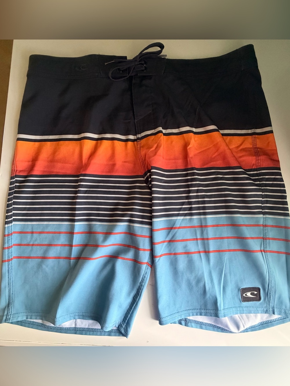 O'Neill Men’s Black, Orange & Light Blue Striped Board Shorts